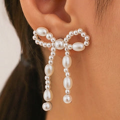 Brincos de Pino com Laço – Nova Coleção Feminina em Destaque