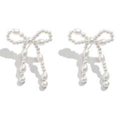Brincos de Pino com Laço – Nova Coleção Feminina em Destaque