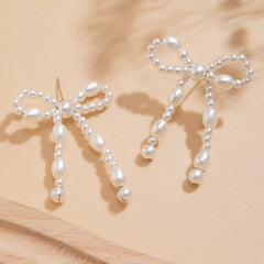 Brincos de Pino com Laço – Nova Coleção Feminina em Destaque