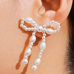 Brincos de Pino com Laço – Nova Coleção Feminina em Destaque